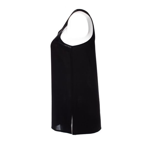 Victoria Beckham Black top with leather details.
